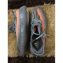 BUY A PAIR OF YEEZY BOOST 350 ORANGE and GREY ANG GET A WATCH FREE